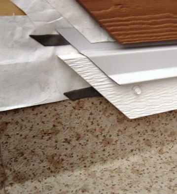 Image of the outside edge of different vinyl decking materials